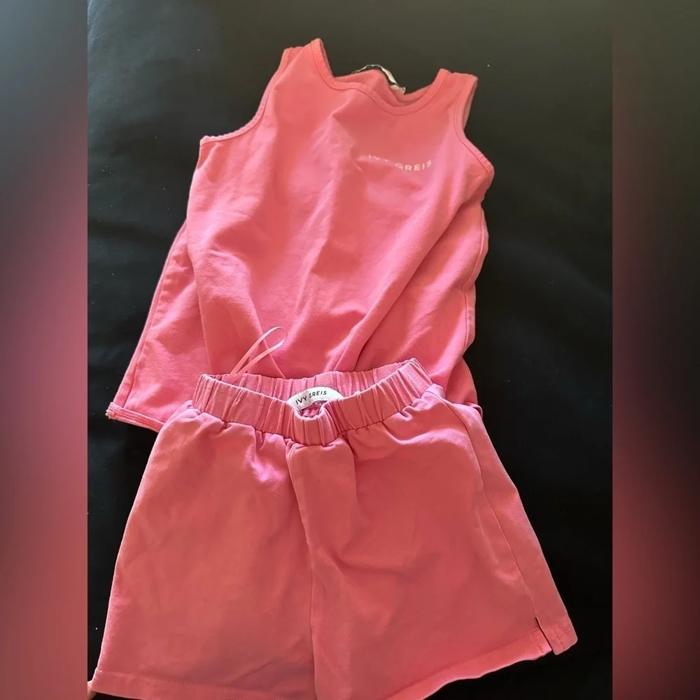 Girls pink top and shorts set in size 4T